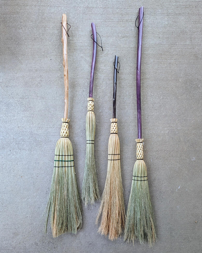 Cobwebber Broom Four cobwebber brooms, lined up.
